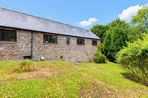 Rear elevation and garden - click for photo gallery